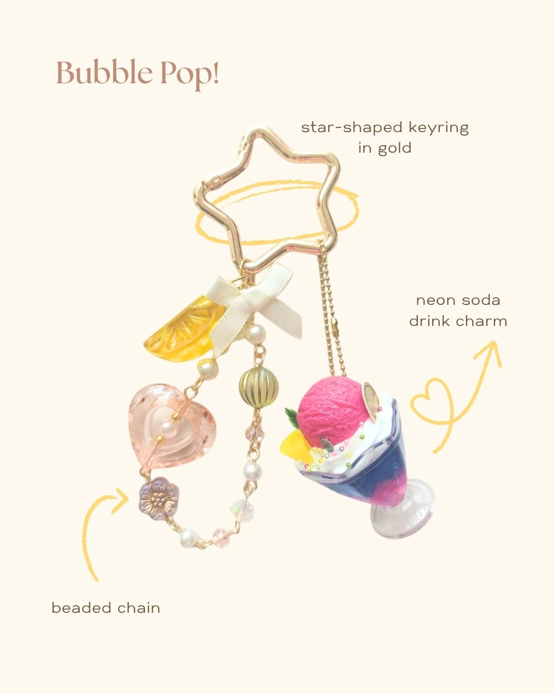 Decorative keychain with star-shaped keyring, neon soda drink charm, and beaded chain on a white background.
